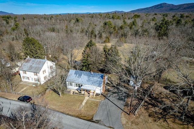 birds eye view of property featuring a mountain view