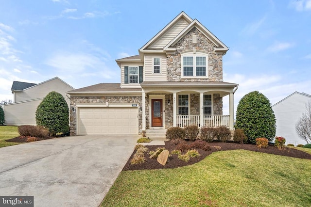 view of front facade featuring a porch, an attached garage, concrete driveway, a front lawn, and stone siding