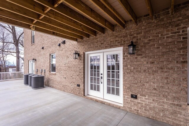 view of patio / terrace featuring cooling unit and french doors