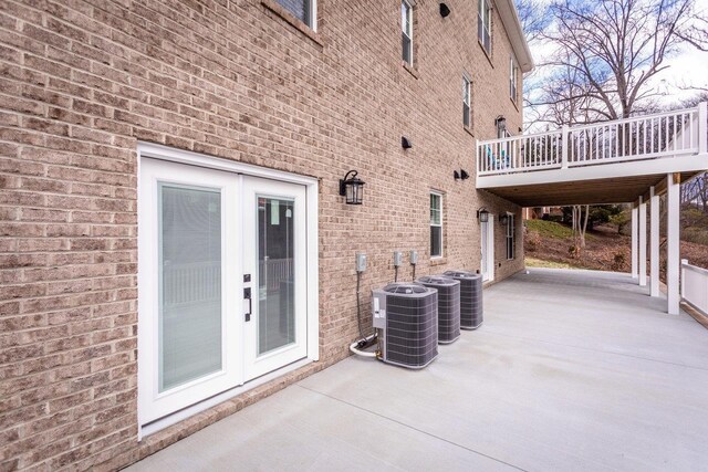 view of patio / terrace with central AC and french doors