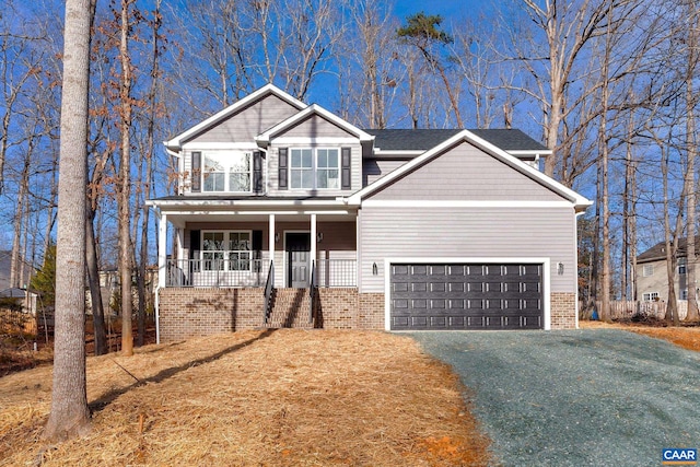 view of front of home featuring a front yard and covered porch