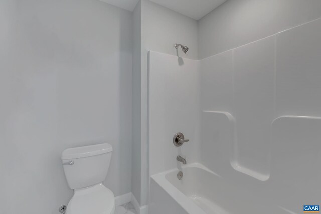 bathroom with toilet and shower / bath combination