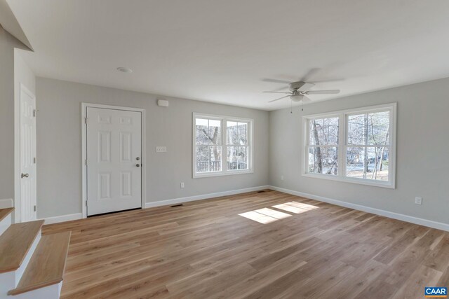 interior space featuring ceiling fan and light hardwood / wood-style floors