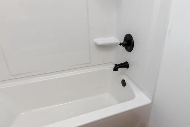 bathroom featuring a tub to relax in