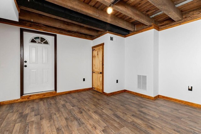 interior space with dark hardwood / wood-style floors and wooden ceiling