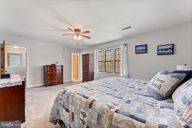 bedroom featuring light carpet, baseboards, visible vents, and a ceiling fan