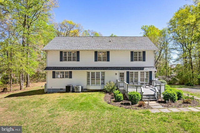 back of house featuring a yard, crawl space, central AC unit, and a deck