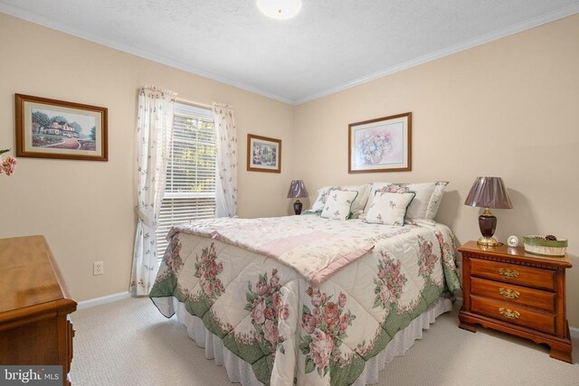 carpeted bedroom with ornamental molding