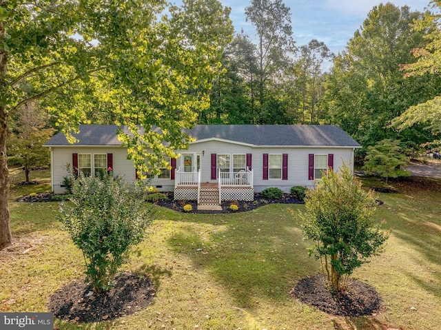 view of front of home with a front lawn