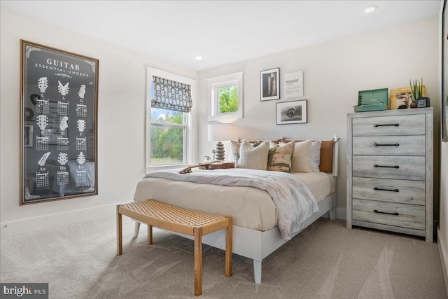 bedroom with light carpet