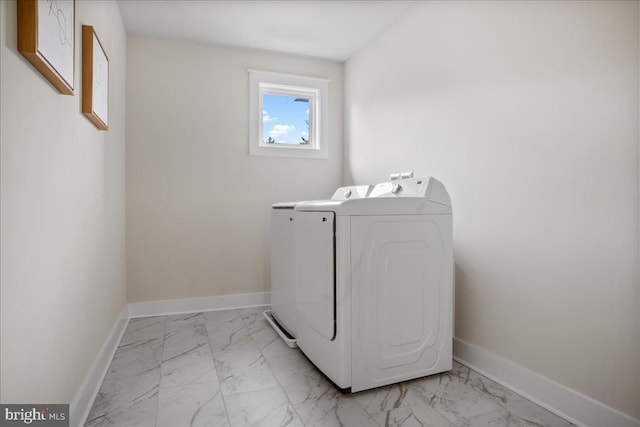 laundry area featuring washer and clothes dryer