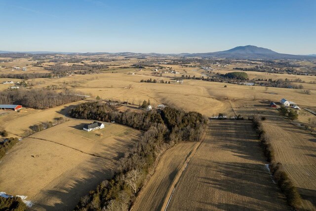 aerial view featuring a rural view and a mountain view