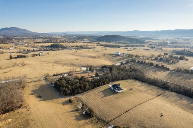 bird's eye view with a mountain view and a rural view