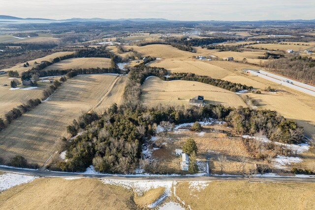 birds eye view of property featuring a rural view and a mountain view