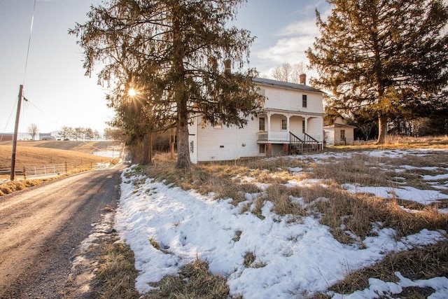 view of snow covered property