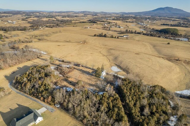 birds eye view of property featuring a rural view and a mountain view