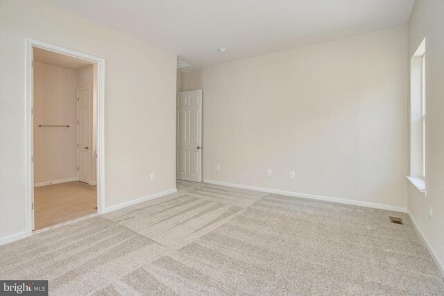 view of carpeted spare room