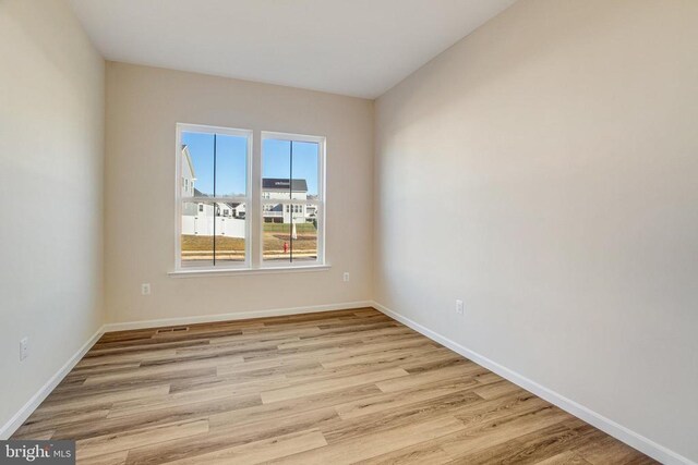 empty room featuring light wood-type flooring