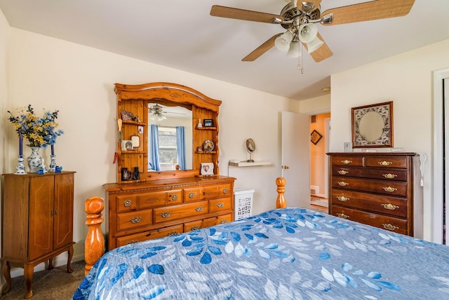 bedroom featuring ceiling fan and carpet flooring