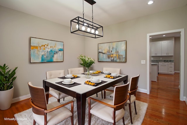 dining room featuring hardwood / wood-style flooring