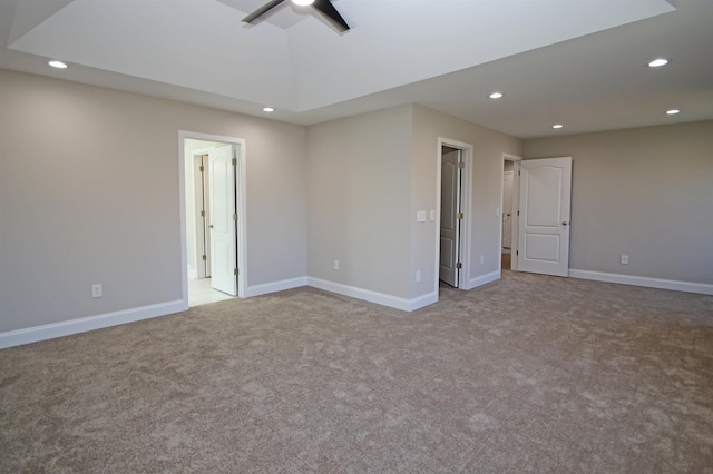 carpeted empty room with ceiling fan