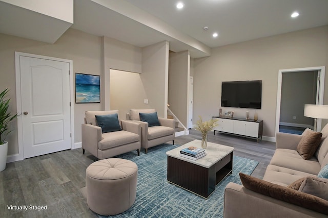 living room with dark hardwood / wood-style flooring