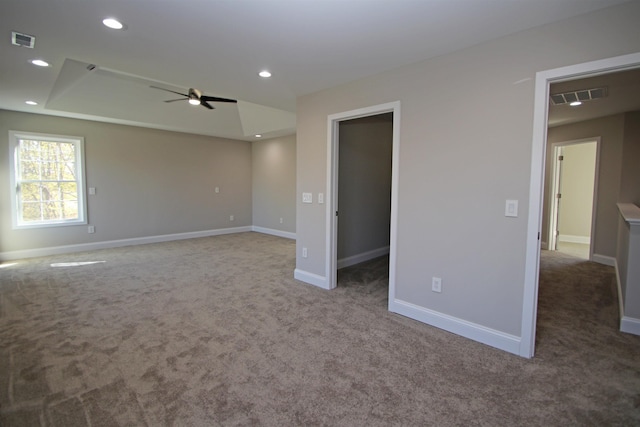 spare room with carpet floors and ceiling fan