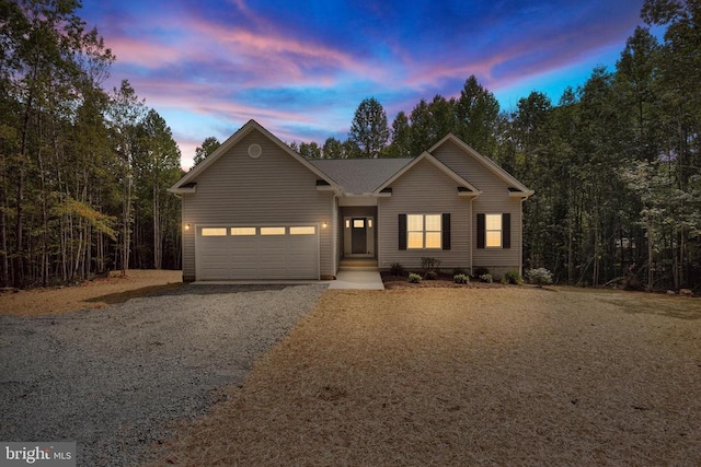 front of property with a garage