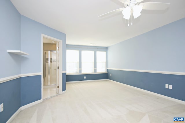 unfurnished bedroom with baseboards, carpet floors, and ceiling fan