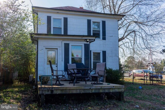 view of front of home with a deck