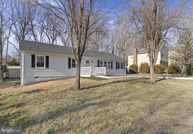 ranch-style house with a front yard