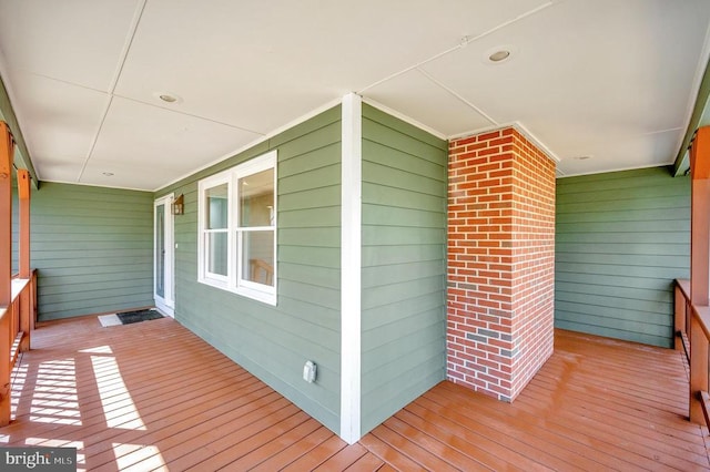 wooden deck featuring covered porch