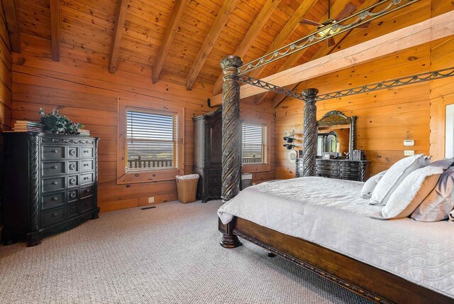 carpeted bedroom featuring wood ceiling, vaulted ceiling with beams, and wood walls