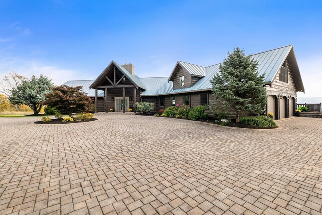 view of front of property with a garage