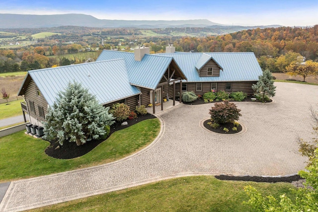 drone / aerial view featuring a mountain view