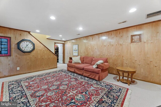 living room featuring ornamental molding, carpet, visible vents, and recessed lighting