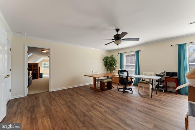 office with baseboards, visible vents, ornamental molding, and wood finished floors