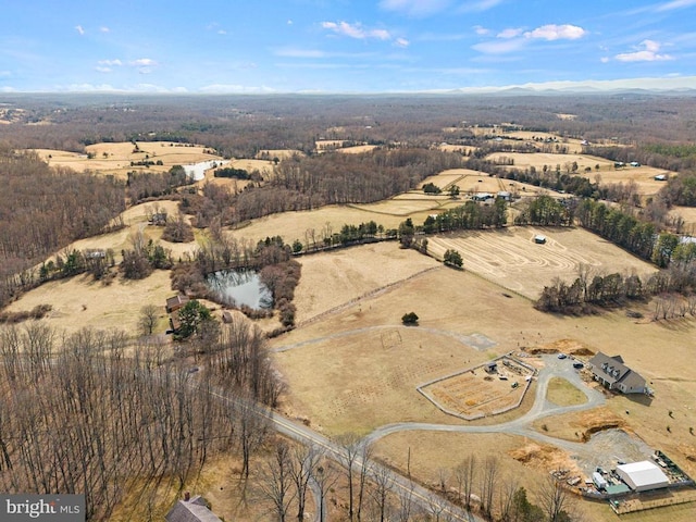 birds eye view of property featuring a rural view