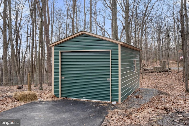 view of outbuilding with a garage