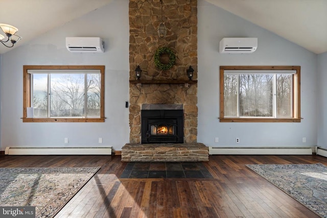 unfurnished living room featuring a fireplace, a wall mounted AC, and a baseboard heating unit