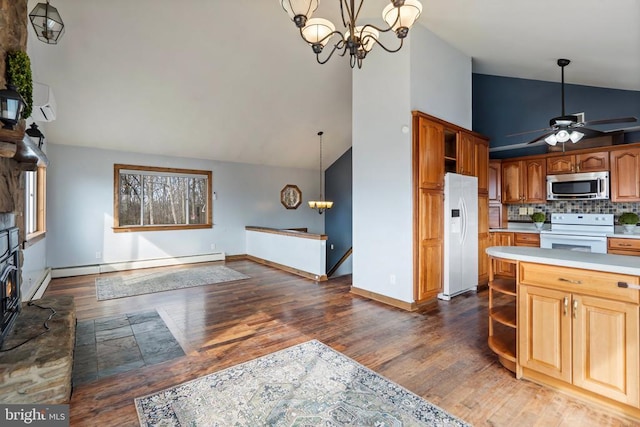 kitchen featuring pendant lighting, a baseboard radiator, dark hardwood / wood-style flooring, decorative backsplash, and white appliances