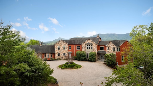 view of front of home featuring a mountain view