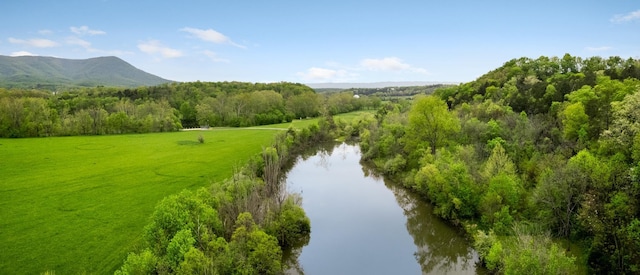 bird's eye view with a water and mountain view