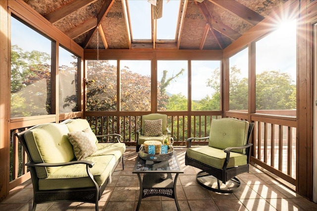 sunroom with lofted ceiling and a healthy amount of sunlight