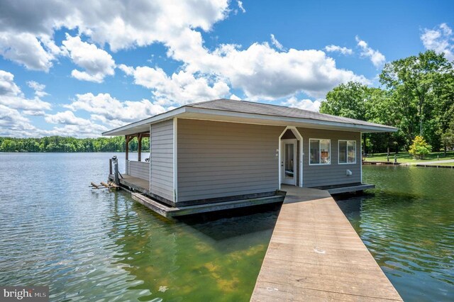 view of dock with a water view