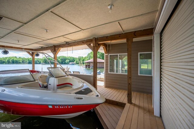 dock area with a water view