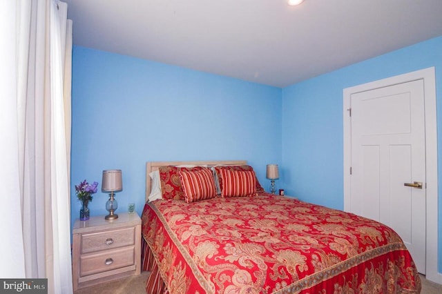 bedroom featuring carpet flooring