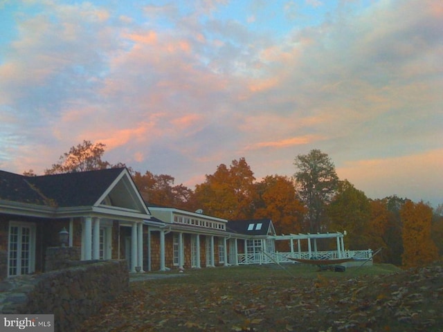 view of property exterior at dusk