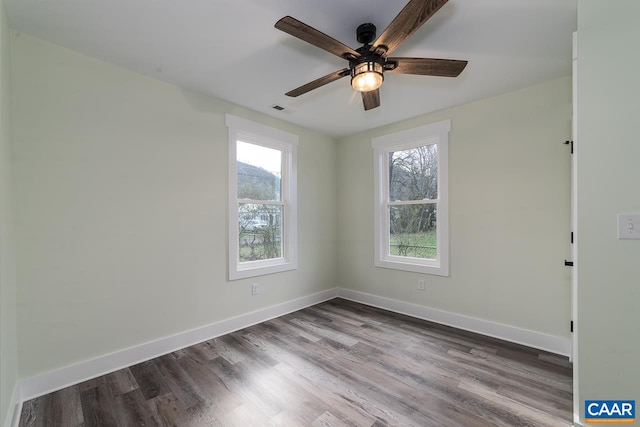 unfurnished room with wood-type flooring and ceiling fan