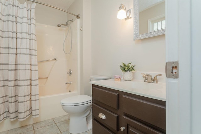 bathroom with tile patterned floors, vanity, toilet, and shower / tub combo